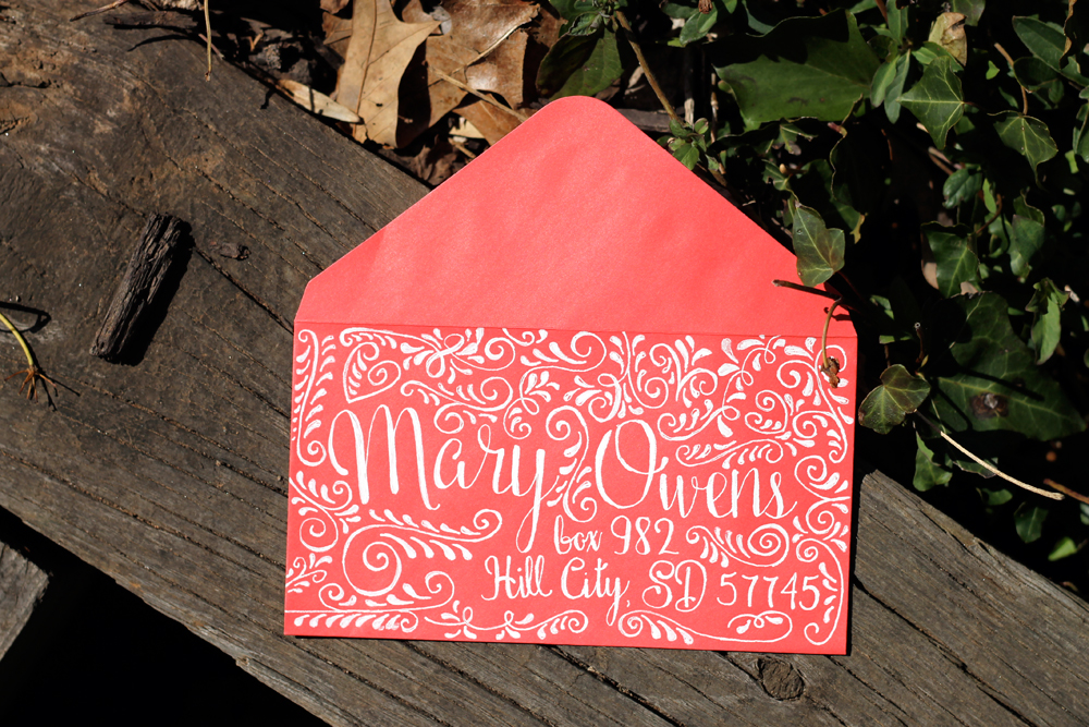 red_swirl_envelope